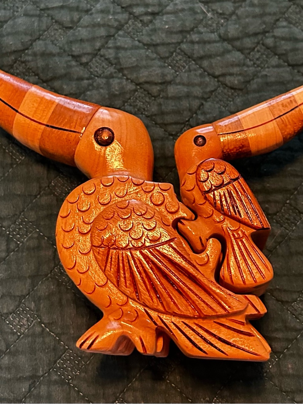 Wooden toucan bird puzzle decor.